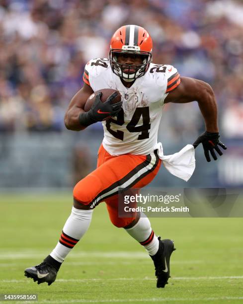 Nick Chubb of the Cleveland Browns runs the ball during the second half against the Baltimore Ravens at M&T Bank Stadium on October 23, 2022 in...