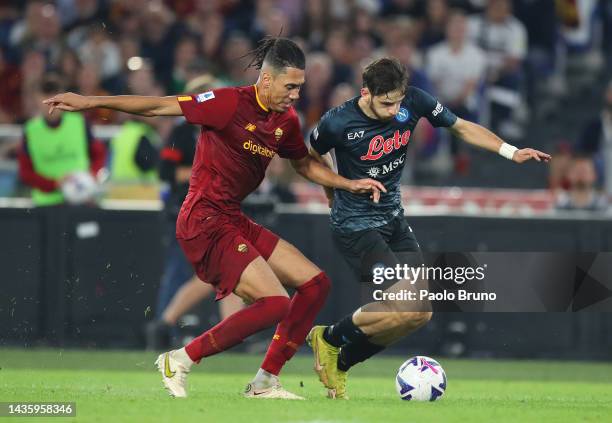 Khvicha Kvaratskhelia of SSC Napoli battles for possession with Chris Smalling of AS Roma during the Serie A match between AS Roma and SSC Napoli at...