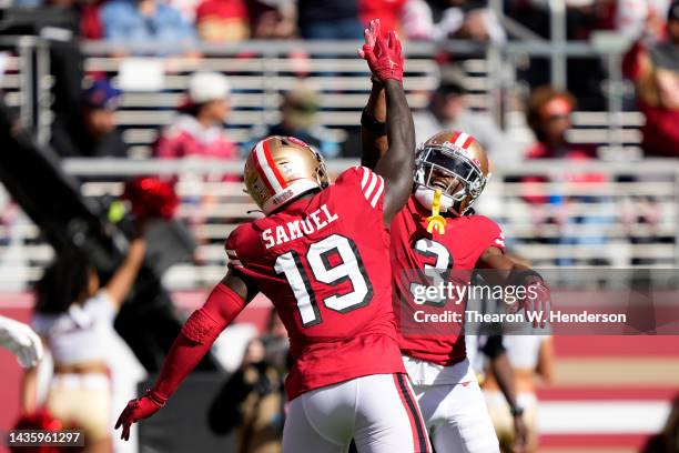 Ray-Ray McCloud III of the San Francisco 49ers celebrates with Deebo Samuel of the San Francisco 49ers after catching a touchdown pass in the first...