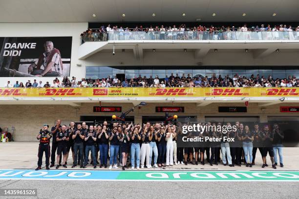 The Red Bull Racing team applaud in tribute to the late Dietrich Mateschitz during the F1 Grand Prix of USA at Circuit of The Americas on October 23,...