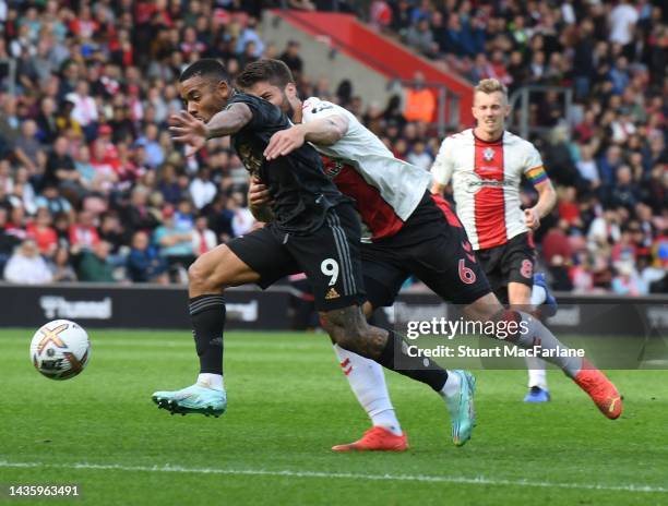Gabriel Jesus of Arsenal challenged by Duje Caleta-Car of Southampton during the Premier League match between Southampton FC and Arsenal FC at...