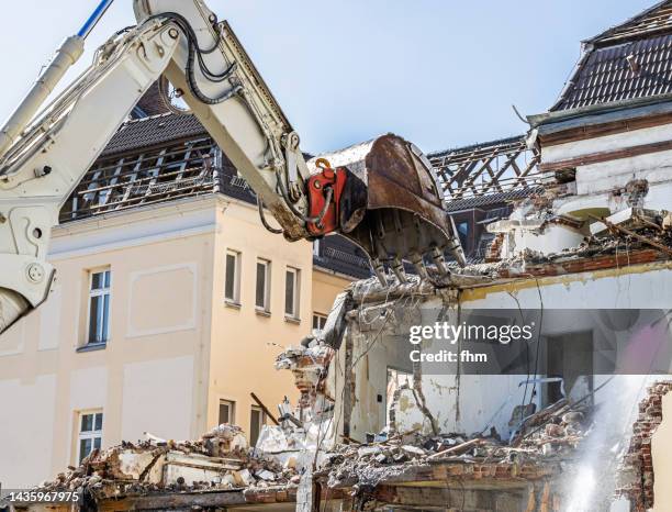 house demolition - bulldozer house stock pictures, royalty-free photos & images