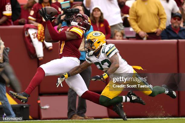 Terry McLaurin of the Washington Commanders catches a touchdown pass during the third quarter of the game against the Green Bay Packers at FedExField...