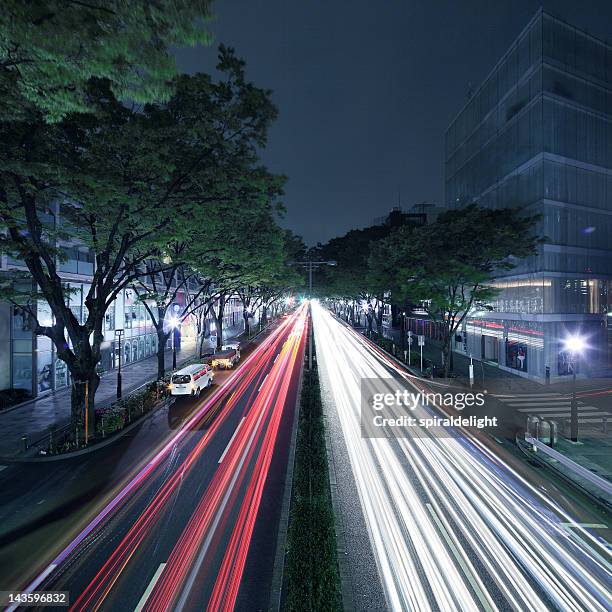 car light trails - harajuku stock pictures, royalty-free photos & images