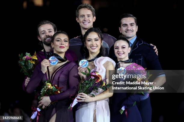 From left, silver medalists Kaitlin Hawayek and Jean-Luc Baker of the United States, gold medalists Madison Chock and Evan Bates of the United...