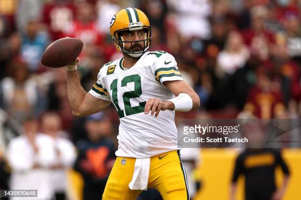 Aaron Rodgers of the Green Bay Packers attempts a pass during the third quarter of the game against the Washington Commanders at FedExField on...