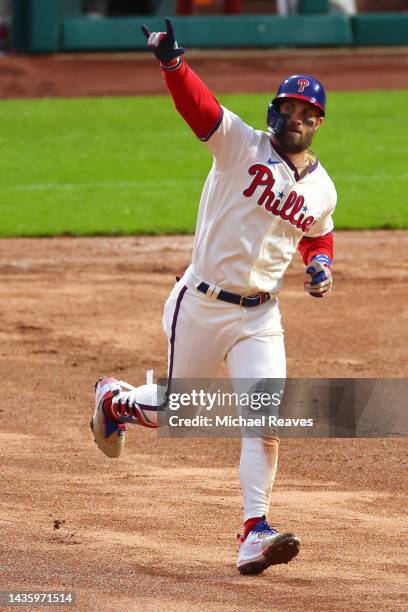 Bryce Harper of the Philadelphia Phillies runs the bases following a two run home run against the San Diego Padres during the eighth inning in game...