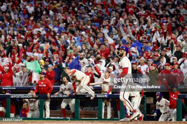 Bryce Harper of the Philadelphia Phillies hits a two run home run during the eighth inning against the San Diego Padres in game five of the National...