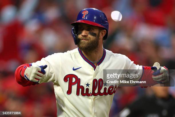 Bryce Harper of the Philadelphia Phillies reacts after hitting a two run home run during the eighth inning against the San Diego Padres in game five...