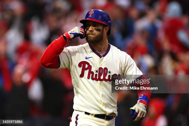 Bryce Harper of the Philadelphia Phillies reacts after hitting a two run home run during the eighth inning against the San Diego Padres in game five...