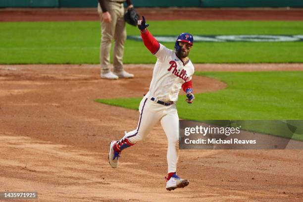 Bryce Harper of the Philadelphia Phillies runs the bases after hitting a two run home run during the eighth inning against the San Diego Padres in...