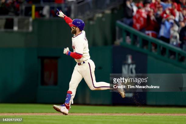 Bryce Harper of the Philadelphia Phillies runs the bases after hitting a two run home run during the eighth inning against the San Diego Padres in...