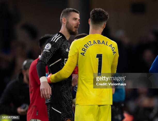 Spain international team-mates David de Gea of Manchester United and Kepa Arrizabalaga of Chelsea chat after the Premier League match between Chelsea...