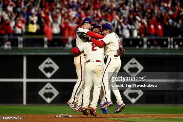 Members of the Philadelphia Phillies celebrate after defeating the San Diego Padres in game five to win the National League Championship Series at...