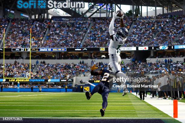 Marquise Goodwin of the Seattle Seahawks completes a touchdown catch during the second quarter of the game against the Los Angeles Chargers at SoFi...