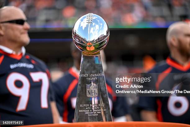 The Lombardi Trophy on display during a halftime celebrations celebrating the teams Super Bowl XXXII win over the Green Bay Packers at Empower Field...
