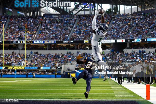 Marquise Goodwin of the Seattle Seahawks completes a touchdown catch during the second quarter of the game against the Los Angeles Chargers at SoFi...