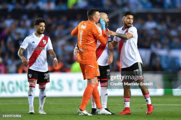 Franco Armani, goalkeeper of River Plate and his teammates Javier Pinola and Paulo Diaz react at the end of a match between Racing Club and River...