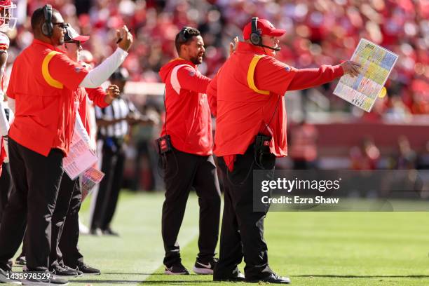 Head coach Andy Reid of the Kansas City Chiefs and the coaching staff direct offense from the sidelines against the San Francisco 49ers in the first...