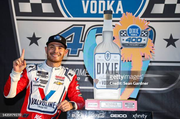 Kyle Larson, driver of the Valvoline Chevrolet, celebrates in victory lane after winning the NASCAR Cup Series Dixie Vodka 400 at Homestead-Miami...