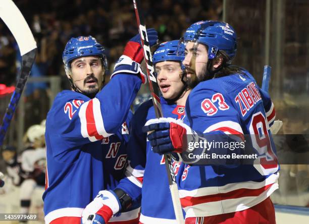 Chris Kreider, Artemi Panarin and Mika Zibanejad of the New York Rangers celebrate Panarin's second period powerplay goal against the Columbus Blue...