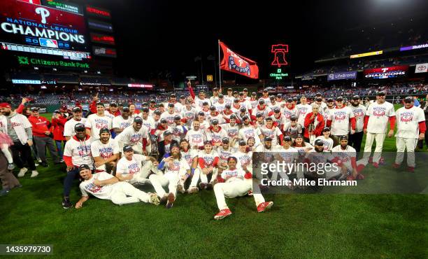 Members of the Philadelphia Phillies pose for a team photo after defeating the San Diego Padres in game five to win the National League Championship...