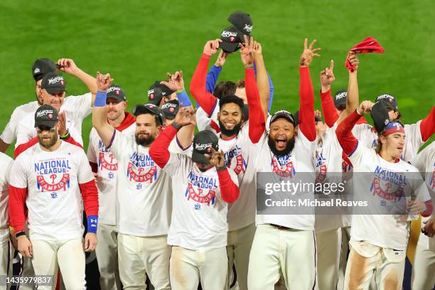 Members of the Philadelphia Phillies celebrate after defeating the San Diego Padres in game five to win the National League Championship Series at...