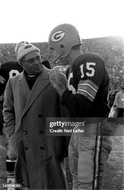 Championship: Green Bay Packers head coach Vince Lombardi and QB Bart Starr on sidelines during game vs New York Giants at City Stadium. Green Bay,...