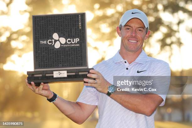 Rory McIlroy of Northern Ireland celebrates with the trophy after winning during the final round of the CJ Cup at Congaree Golf Club on October 23,...