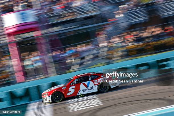 Kyle Larson, driver of the Valvoline Chevrolet, crosses the finish line to win the NASCAR Cup Series Dixie Vodka 400 at Homestead-Miami Speedway on...