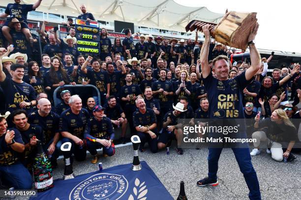 Red Bull Racing Team Principal Christian Horner celebrates winning the F1 World Constructors Championship with his team after the F1 Grand Prix of...