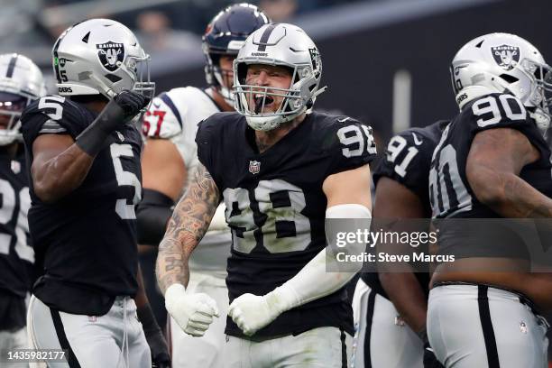 Maxx Crosby of the Las Vegas Raiders celebrates after stopping a third down play in the fourth quarter against the Houston Texans at Allegiant...