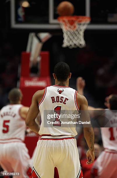 Derrick Rose of the Chicago Bulls watches the ball go off the basket against the Philadelphia 76ers in Game One of the Eastern Conference...