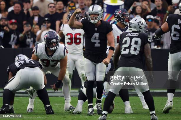 Quarterback Derek Carr of the Las Vegas Raiders reacts after the Houston Texans were called for a neutral zone infraction on a fourth-and-1 play...