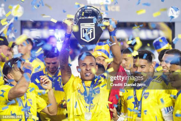 Sebastian Villa of Boca Juniors celebrates with the trophy after a match between Boca Juniors and Independiente as part of Liga Profesional 2022 at...