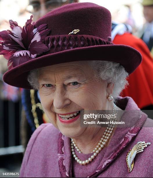 Queen Elizabeth ll, accompanied by her lady-in-waiting, Diana, Lady Farnham, undertakes a walkabout to mark her Diamond Jubilee on April 30, 2012 in...