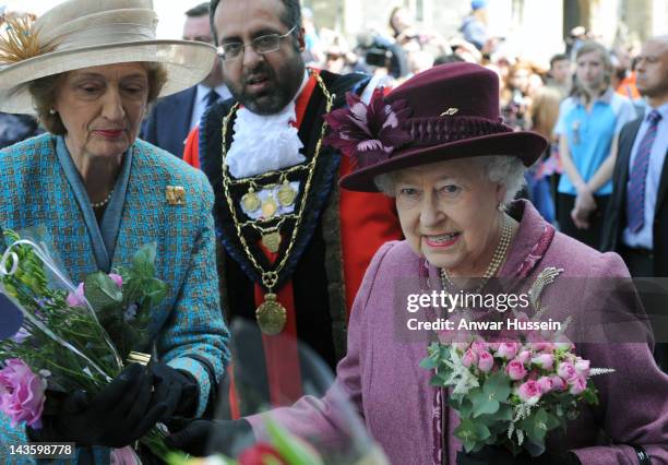 Queen Elizabeth ll, accompanied by her lady-in-waiting, Lady Susan Hussey undertakes a walkabout to mark her Diamond Jubilee on April 30, 2012 in...