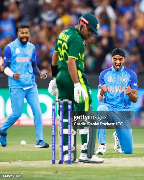 Arshdeep Singh of India celebrates the wicket of Babar Azam of Pakistan during the ICC Men's T20 World Cup match between India and Pakistan at...