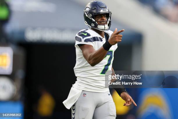 Geno Smith of the Seattle Seahawks celebrates a touchdown during the fourth quarter of the game against the Los Angeles Chargers at SoFi Stadium on...