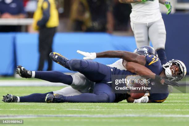 Mike Williams of the Los Angeles Chargers reacts after getting injured during the fourth quarter of the game against the Seattle Seahawks at SoFi...