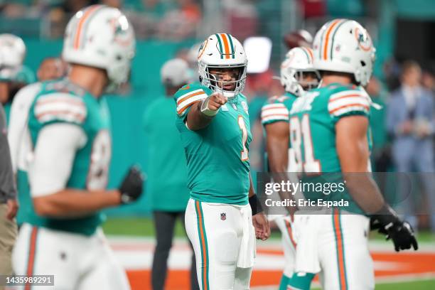 Tua Tagovailoa of the Miami Dolphins calls a play during warm ups prior to the game against the Pittsburgh Steelers at Hard Rock Stadium on October...