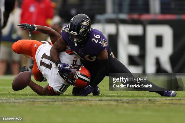 Geno Stone of the Baltimore Ravens attempts to tackle Donovan Peoples-Jones of the Cleveland Browns during the second half of the game at M&T Bank...