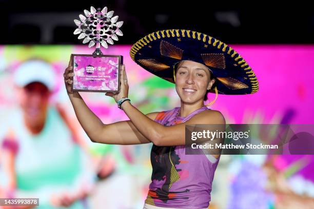 Jessica Pegula of the United States poses with the Tree of Life Trophy after defeating Maria Sakkari of Greece during the final of the WTA...