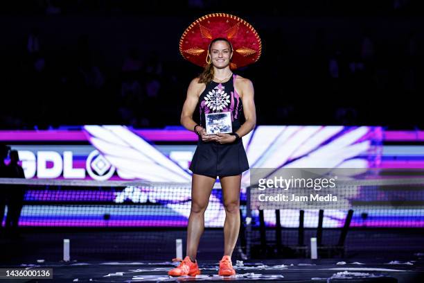 Maria Sakkari of Greece poses with second place trophy after the singles final match between Jessica Pegula of United States and Maria Sakkari of...
