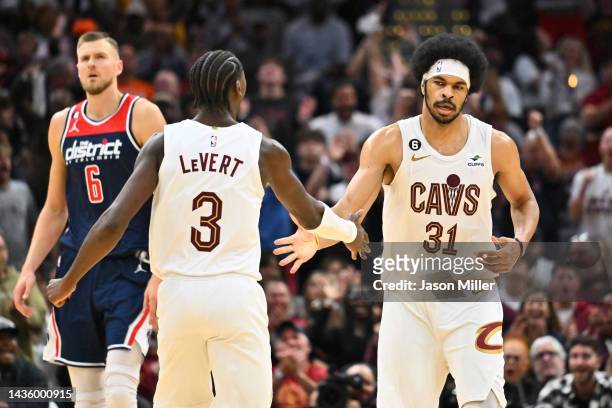 Caris LeVert and Jarrett Allen of the Cleveland Cavaliers celebrate in overtime against the Washington Wizards at Rocket Mortgage Fieldhouse on...