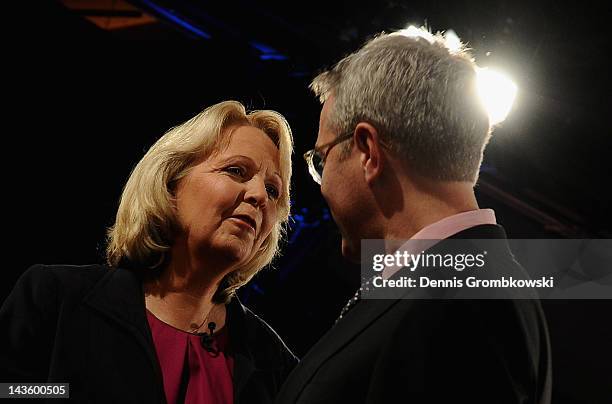 Hannelore Kraft, lead candidate of the German Social Democrats , and Norbert Roettgen, lead candidate of the German Christian Democrats , pose face...