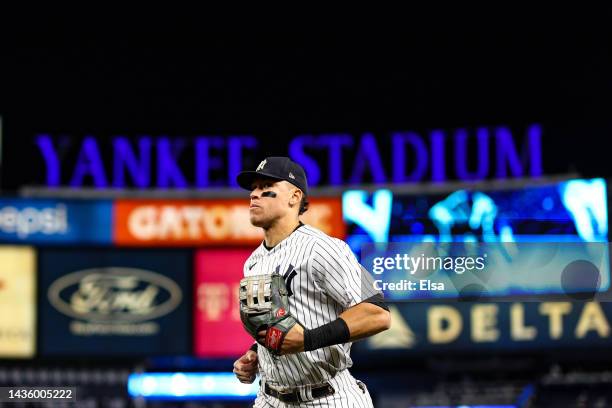 Aaron Judge of the New York Yankees runs to the dugout after the fifth inning against the Houston Astros in game four of the American League...