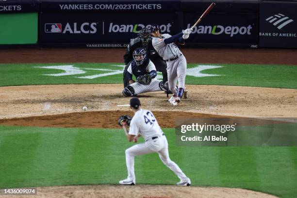 Jeremy Pena of the Houston Astros hits and reaches on a fielders choice in the seventh inning against the New York Yankees in game four of the...