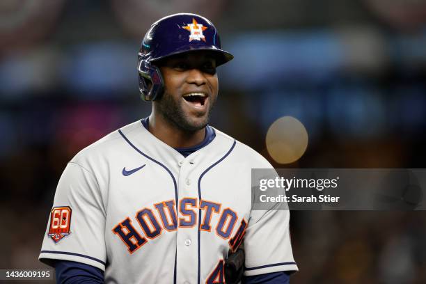 Yordan Alvarez of the Houston Astros reacts after hitting an RBI single to tie the game during the seventh inning against the New York Yankees in...