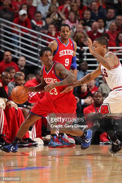 Louis Williams of the Philadelphia 76ers dribbles against Derrick Rose of the Chicago Bulls in Game One of the Eastern Conference Quarterfinals...